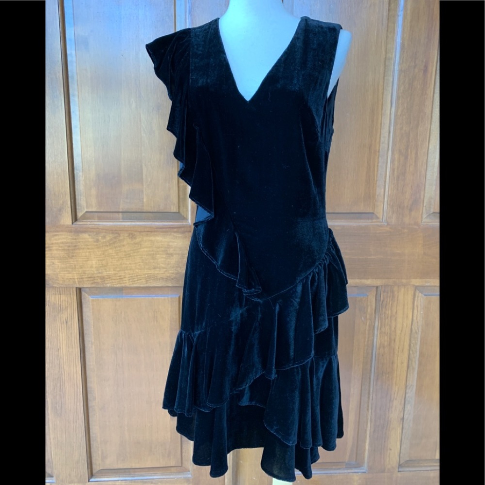 Eye-catching ruffled black velvet mini dress Saks